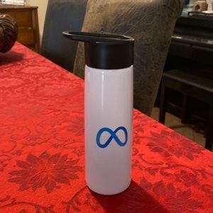 Stainless steel MetaQuest promotional water bottle .